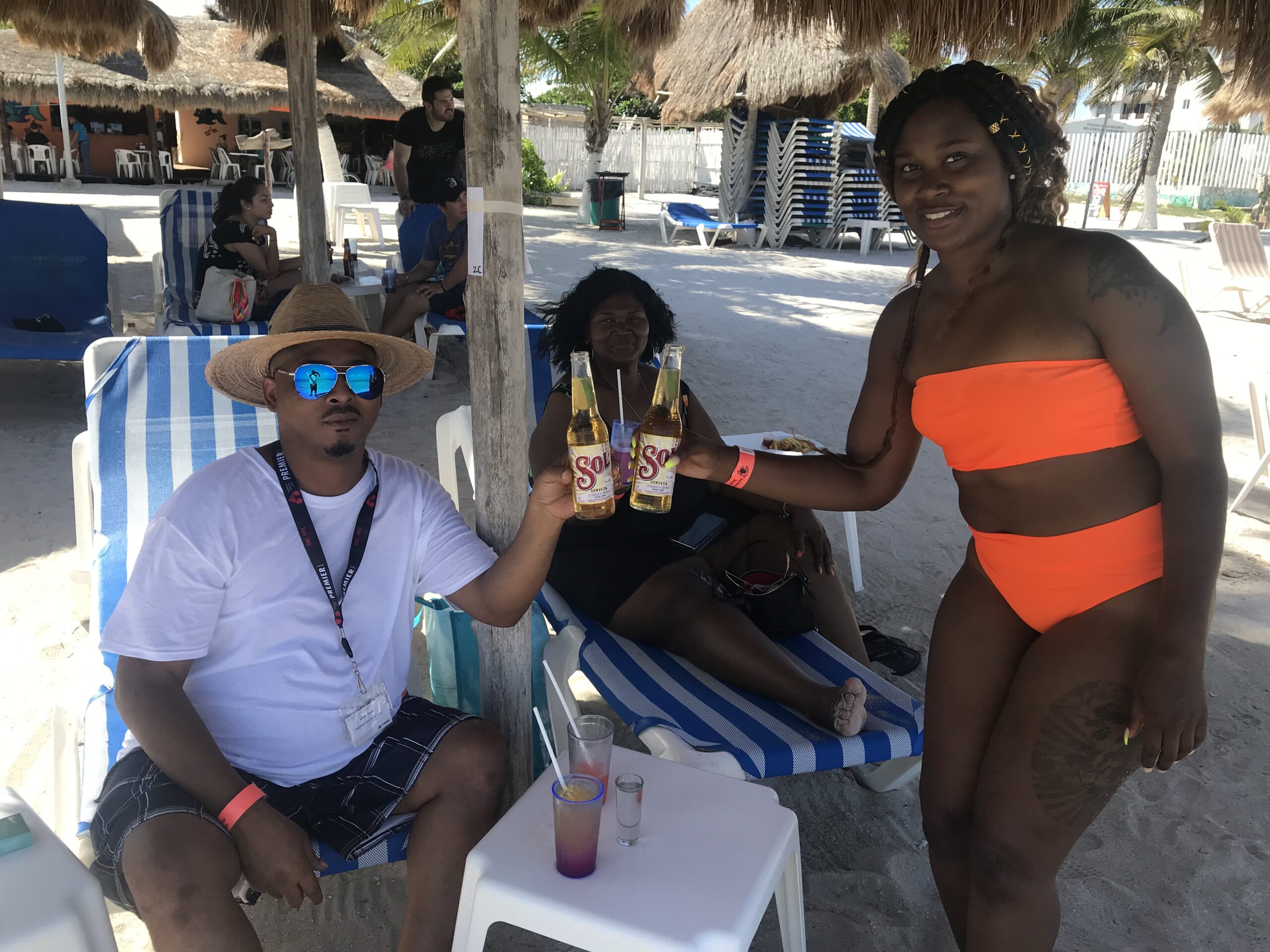 Guests relaxing at Nohoch Kay Beach Club